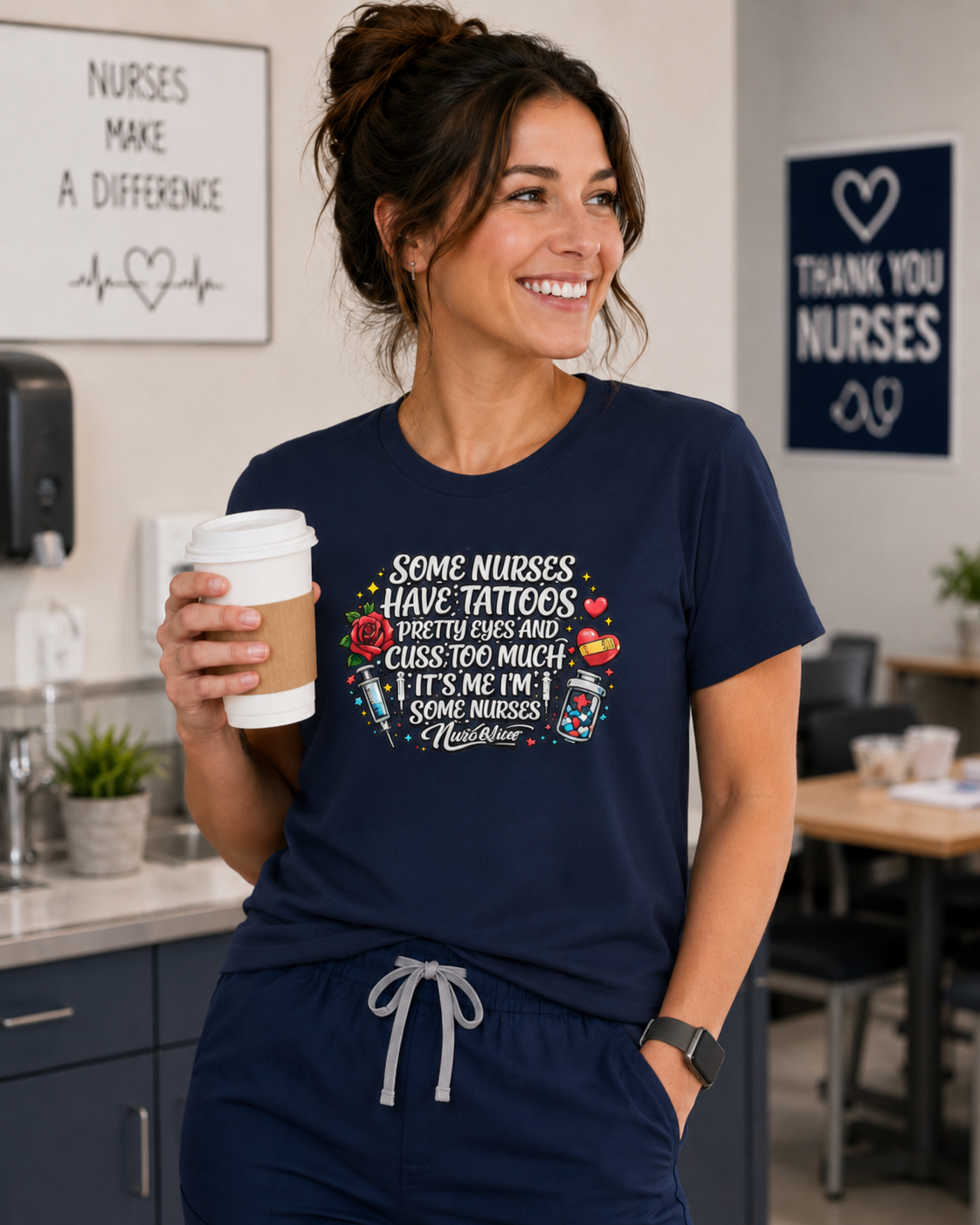 Woman wearing a navy blue t-shirt with a humorous design, holding a coffee cup in a casual setting.