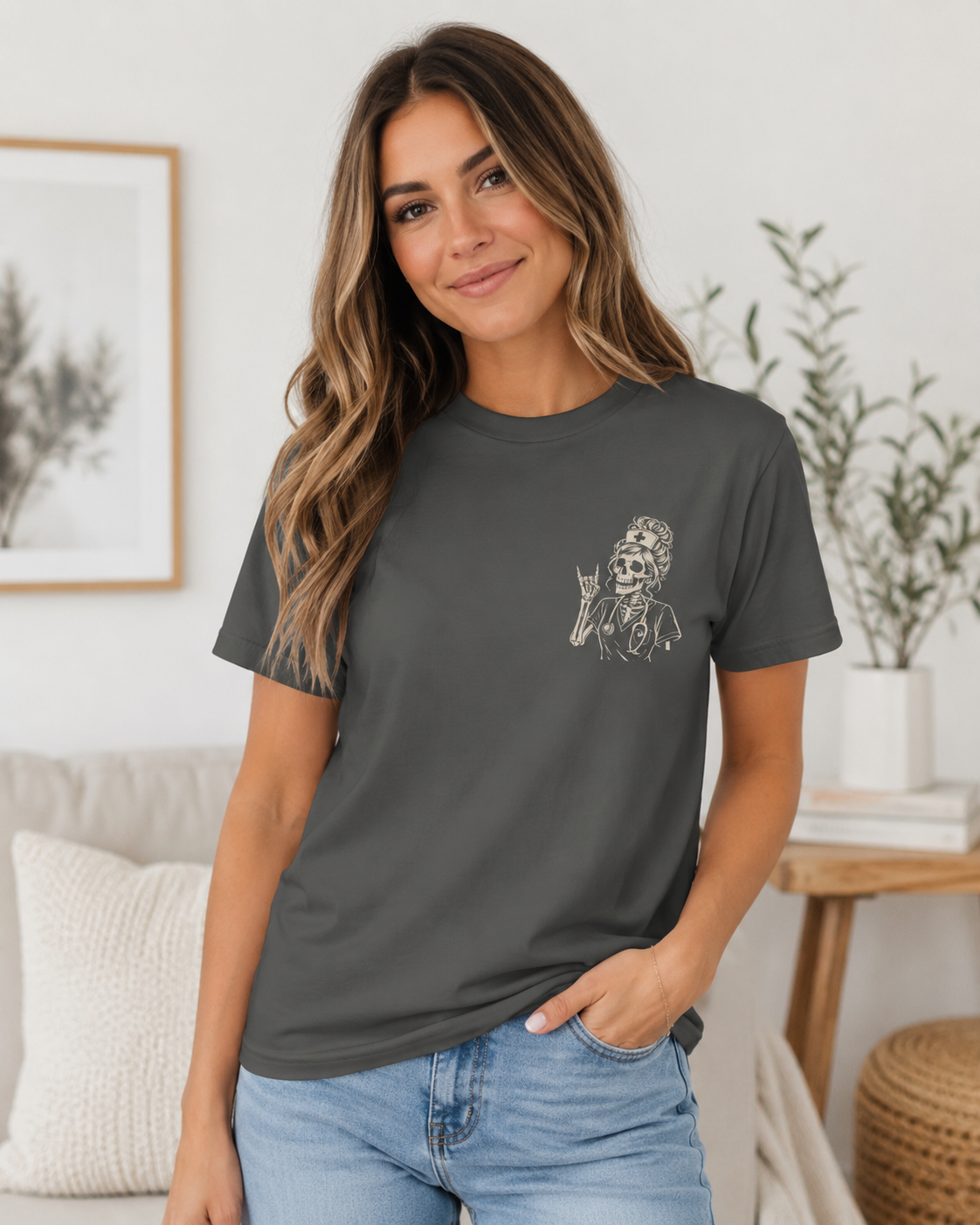 Woman wearing a dark gray t-shirt with a graphic design in a living room setting